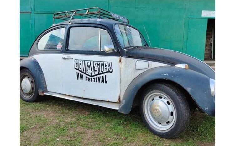 VW Beetle painted with Doncaster VW Festival branding